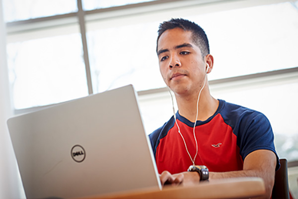 Data Science student on computer