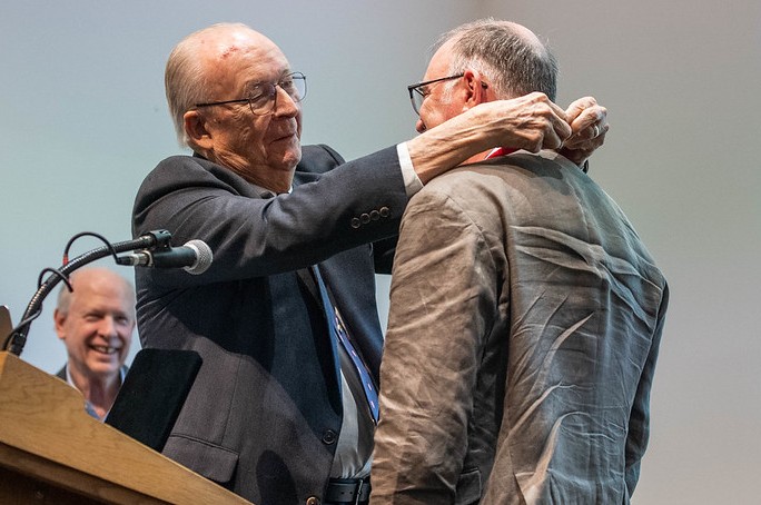 F. James Rohlf presents the Rohlf Medal to P. David Polly