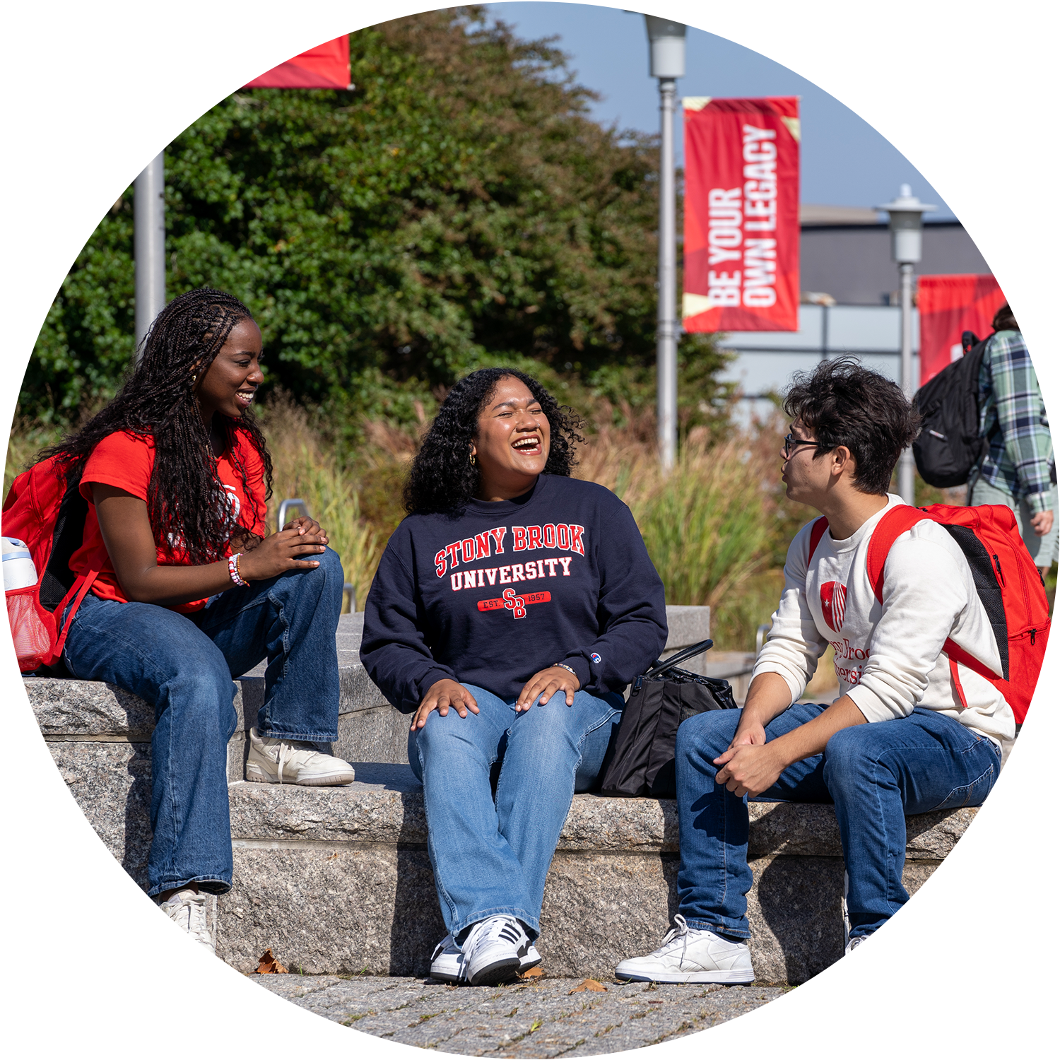 College of Business Online MBA Student on class via his laptop smiling and engaging in the virtual class