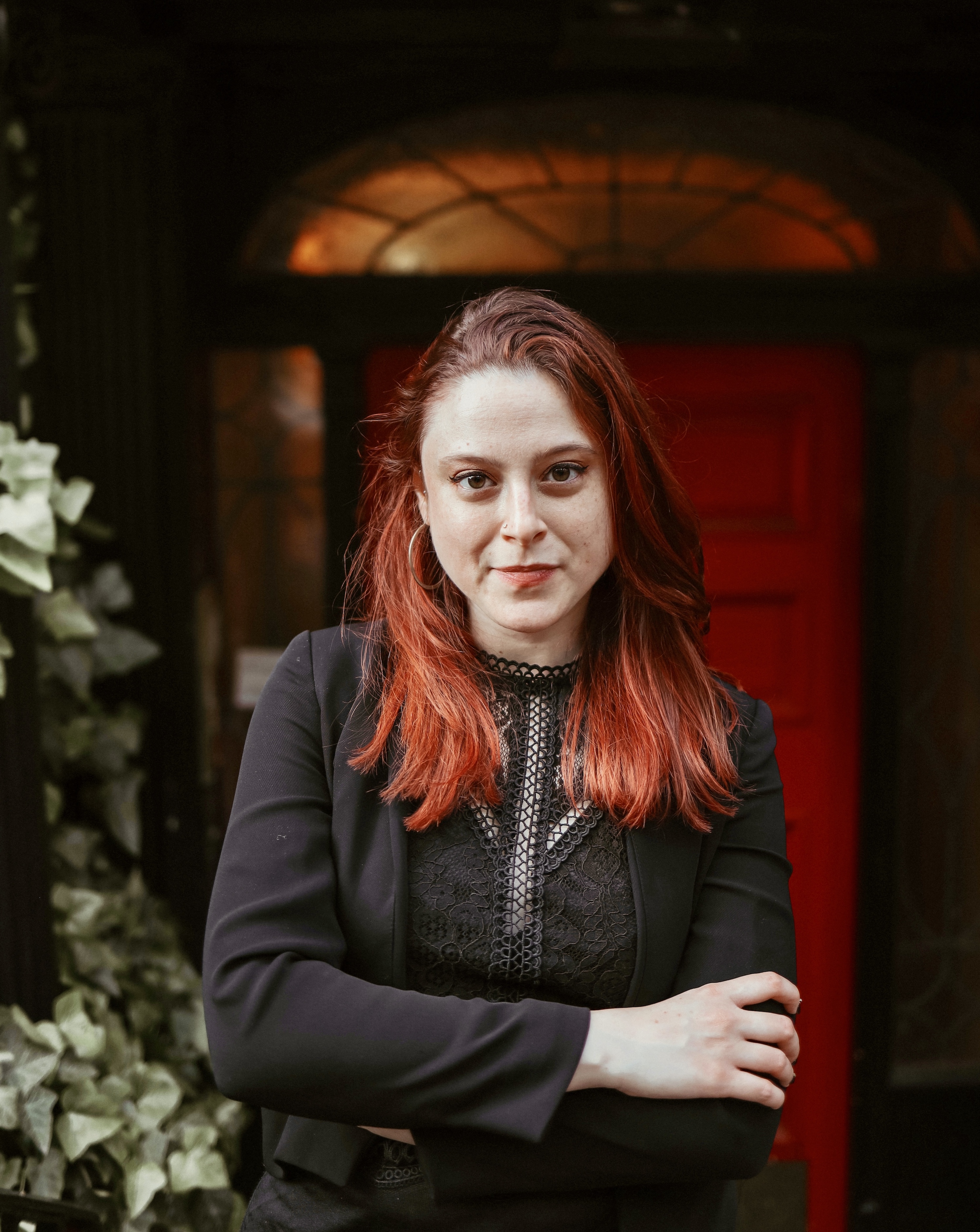 Anna Cahn person with red hair and black clothes