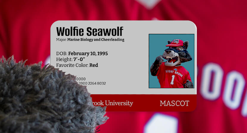 Wolfie holding ID Card