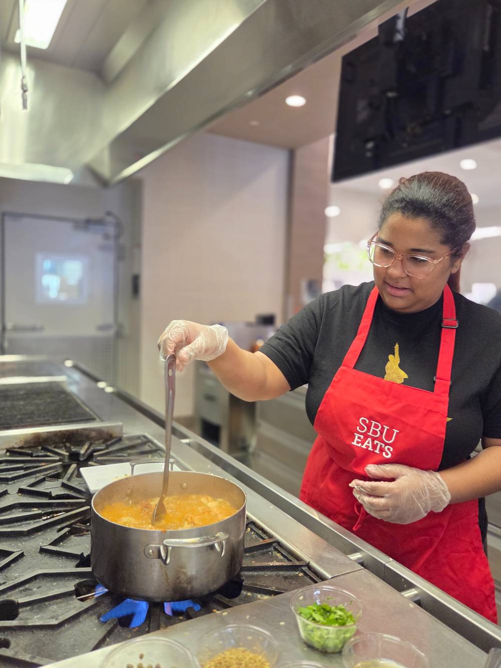 Clari Guzman at the kitchen